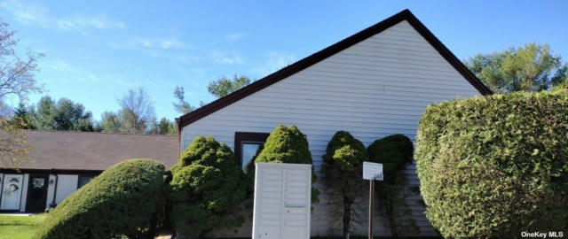 32 MONET CT # 32, MIDDLE ISLAND, NY 11953, photo 3 of 9