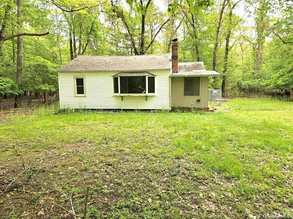 11 SWEEZEY TOWN RD, MIDDLE ISLAND, NY 11953, photo 1 of 6